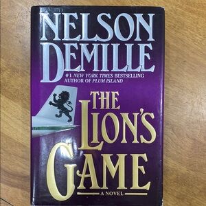 “The Lion’s Game”, by Nelson Demille, hardcover book.